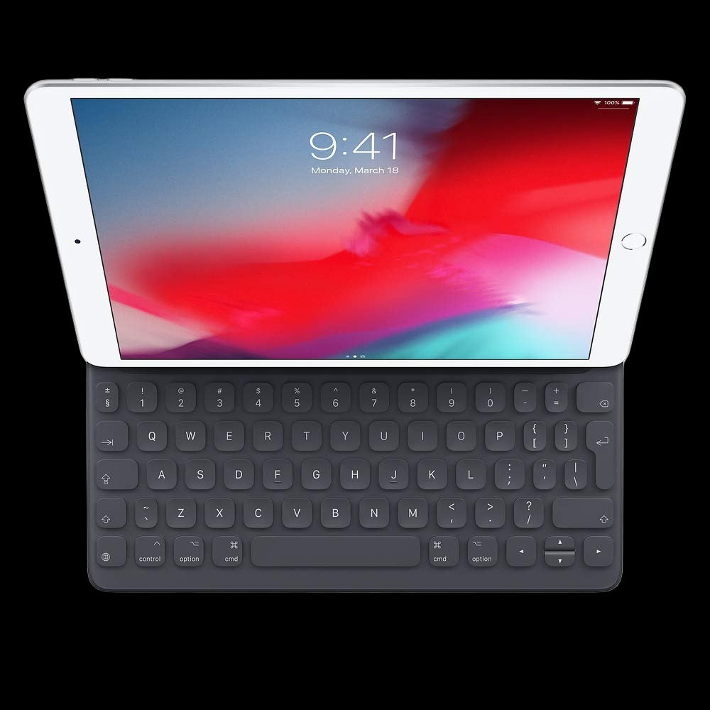 Image of the Apple Magic Keyboard, showcasing its sleek and minimalist design. The keyboard is shown against a white background, highlighting its compact layout, scissor mechanism keys, and built-in trackpad for seamless navigation and typing experience at icrescent apple store in chandigarh