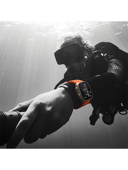 Image of a person swimming while wearing the hypothetical Apple Watch Ultra 2, showcasing its waterproof design and swim tracking capabilities. The watch is shown on the wrist, accurately monitoring swimming metrics such as laps, distance, and stroke type, enhancing the swimmer's performance and progress.